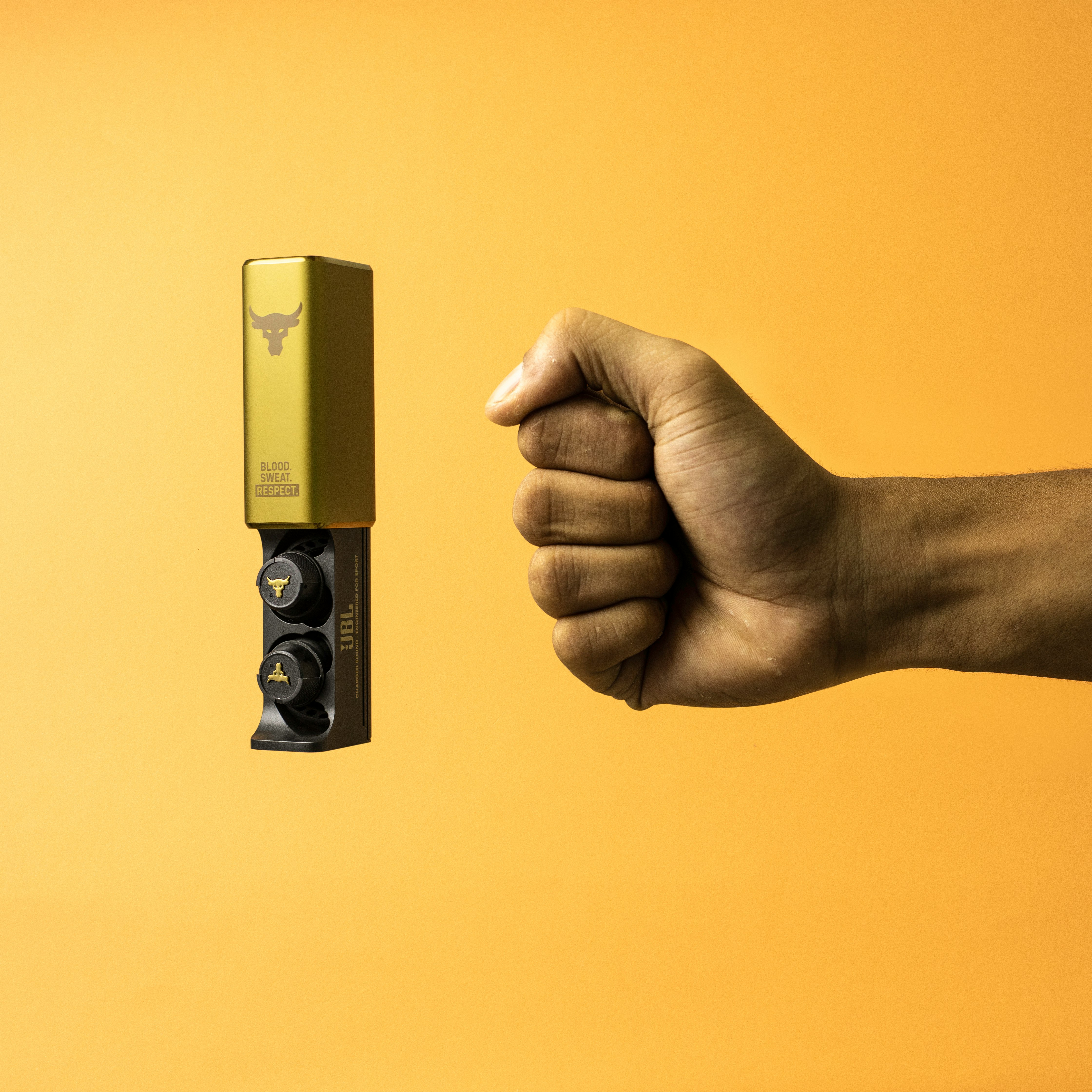 person holding gray and black remote control